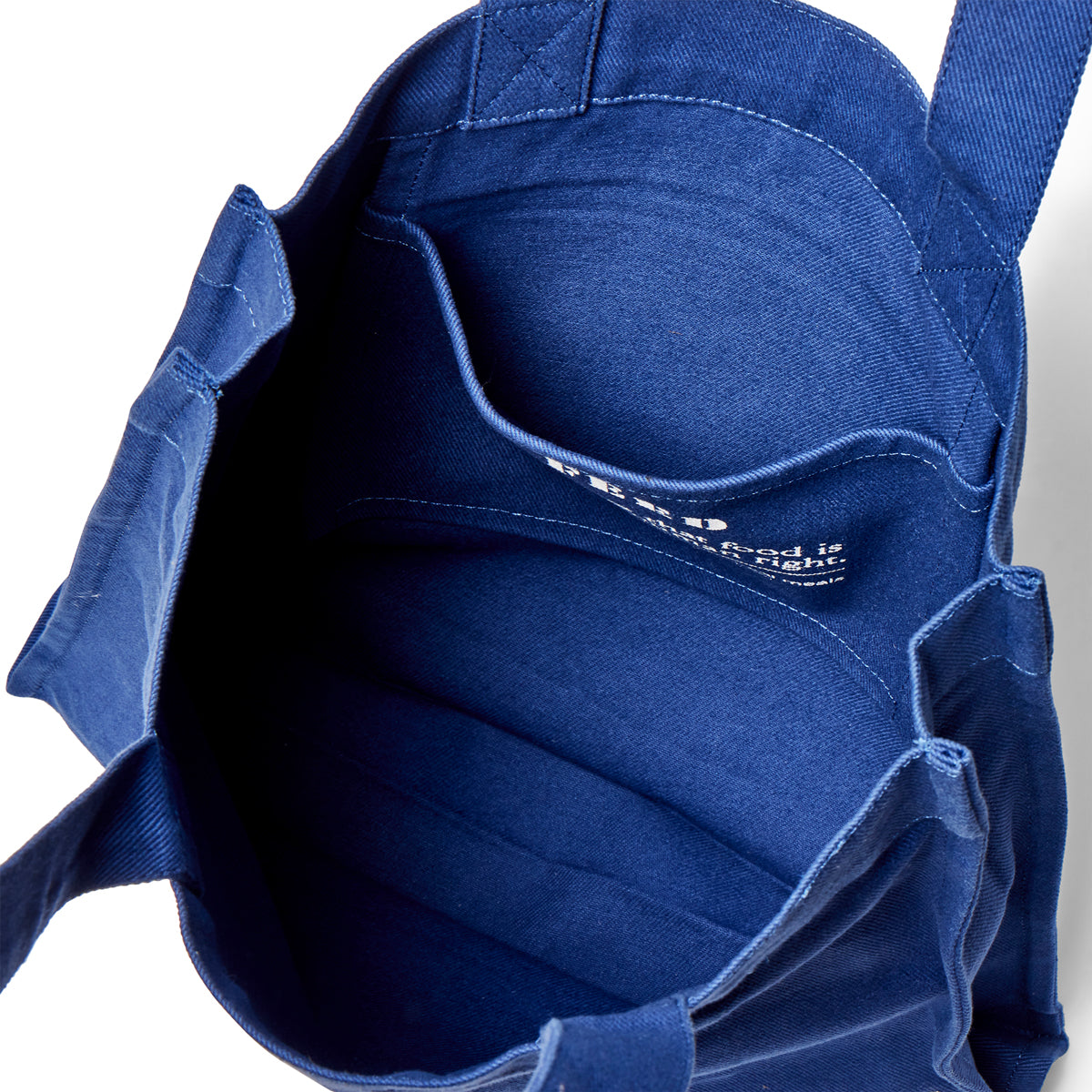 Cobalt | Overhead of cobalt blue Book Bag
