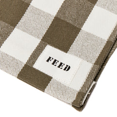 Green Gingham | Detail of FEED label on green gingham Book Bag