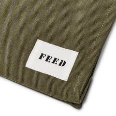 Army Green | Detail of FEED logo on army green Book Bag