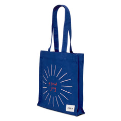 FEED Joy Book Bag | Side of FEED Joy Book Bag cobalt blue