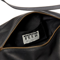 Black | leather bag interior view