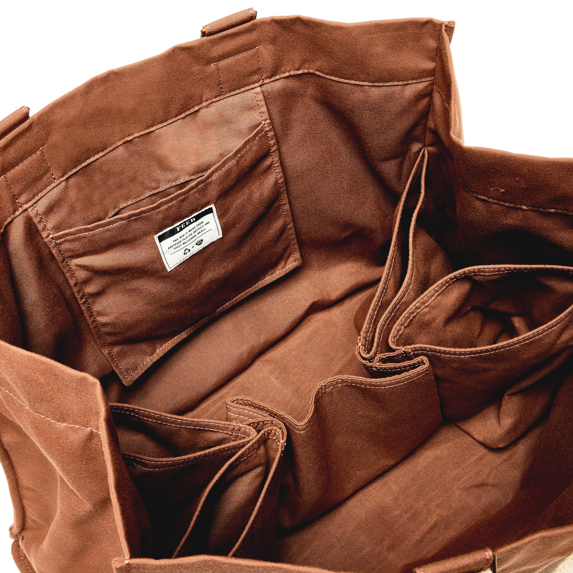 Brown | Interior pockets of brown organizer tote. 